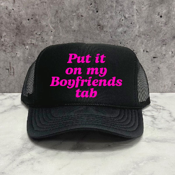 Put it on my Husbands Tab Trucker Hat