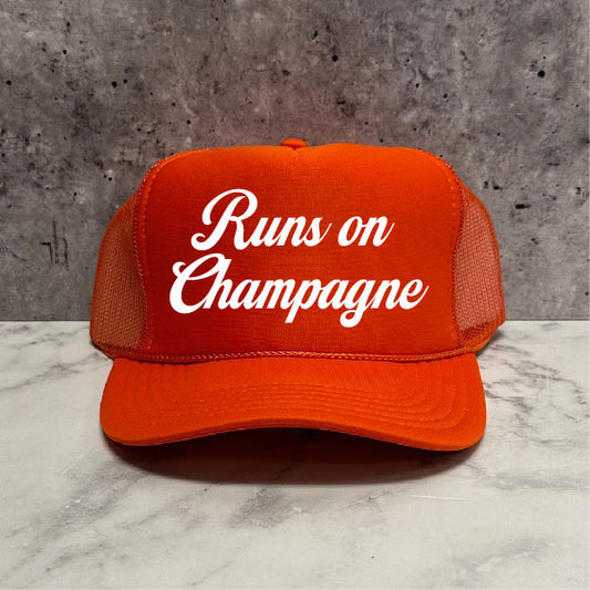 Runs on Champagne Trucker Hat