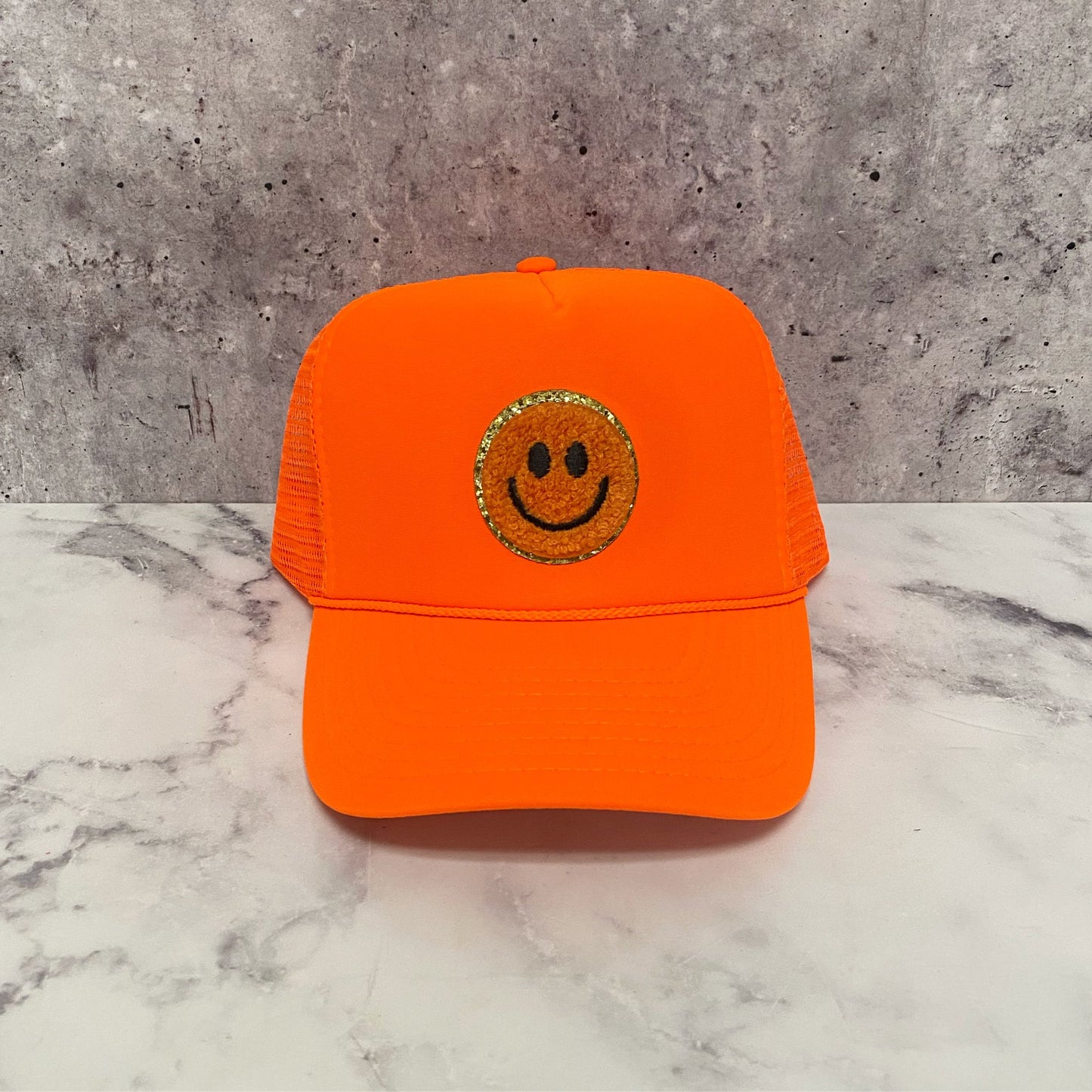 Orange Smiley Patch Trucker Hat