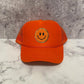 Orange Smiley Patch Trucker Hat